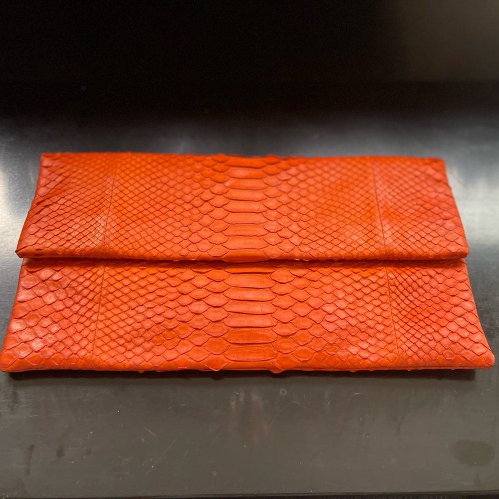 Jordan Goldblum Croc‑Embossed Orange Leather Clutch – Suede-Lined